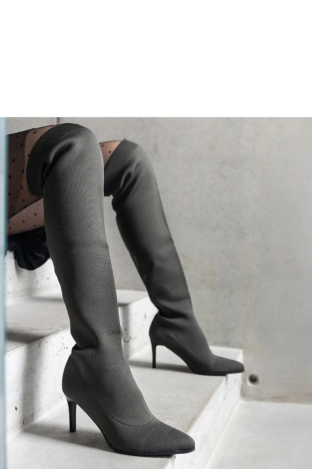 Green stiletto heeled boots