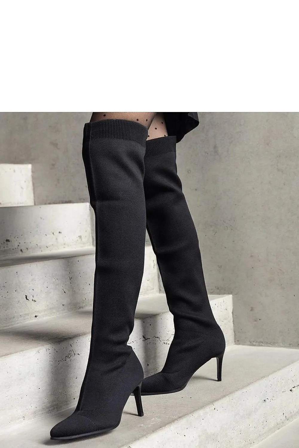 Green stiletto heeled boots