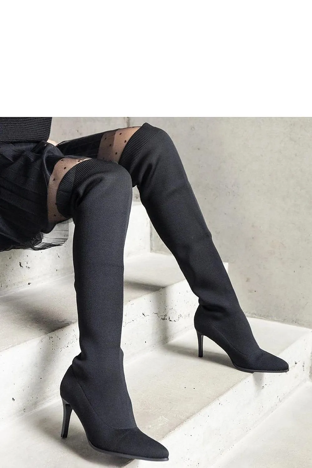 Green stiletto heeled boots