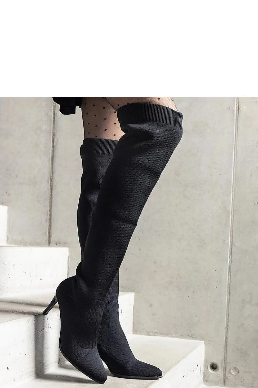 Green stiletto heeled boots