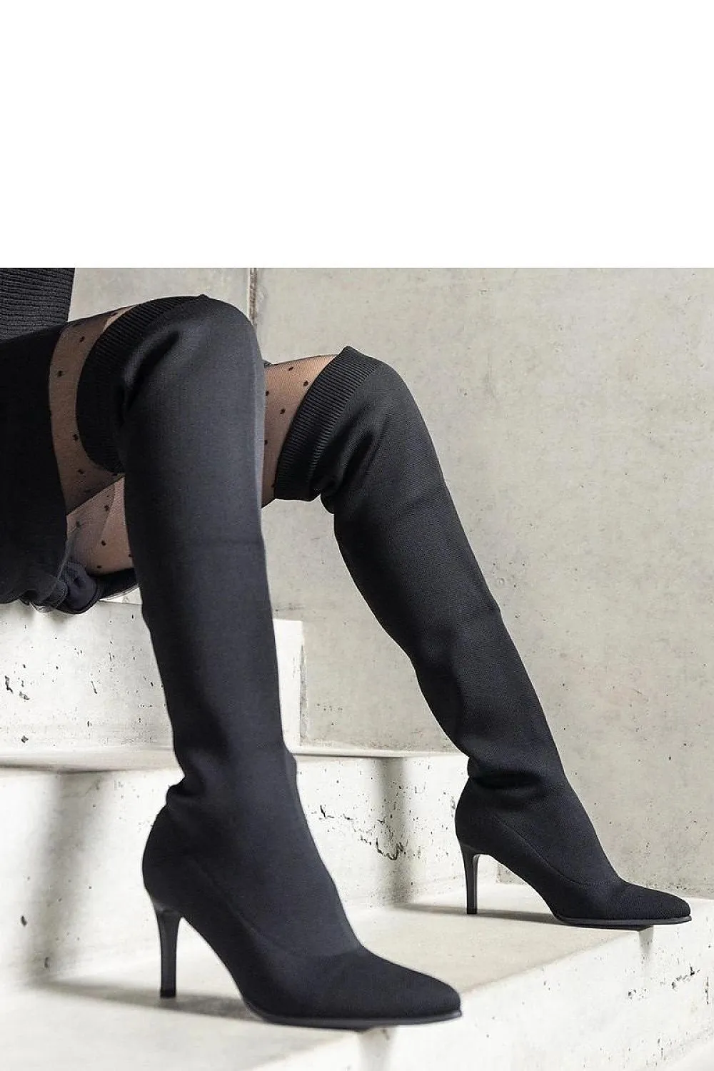 Green stiletto heeled boots
