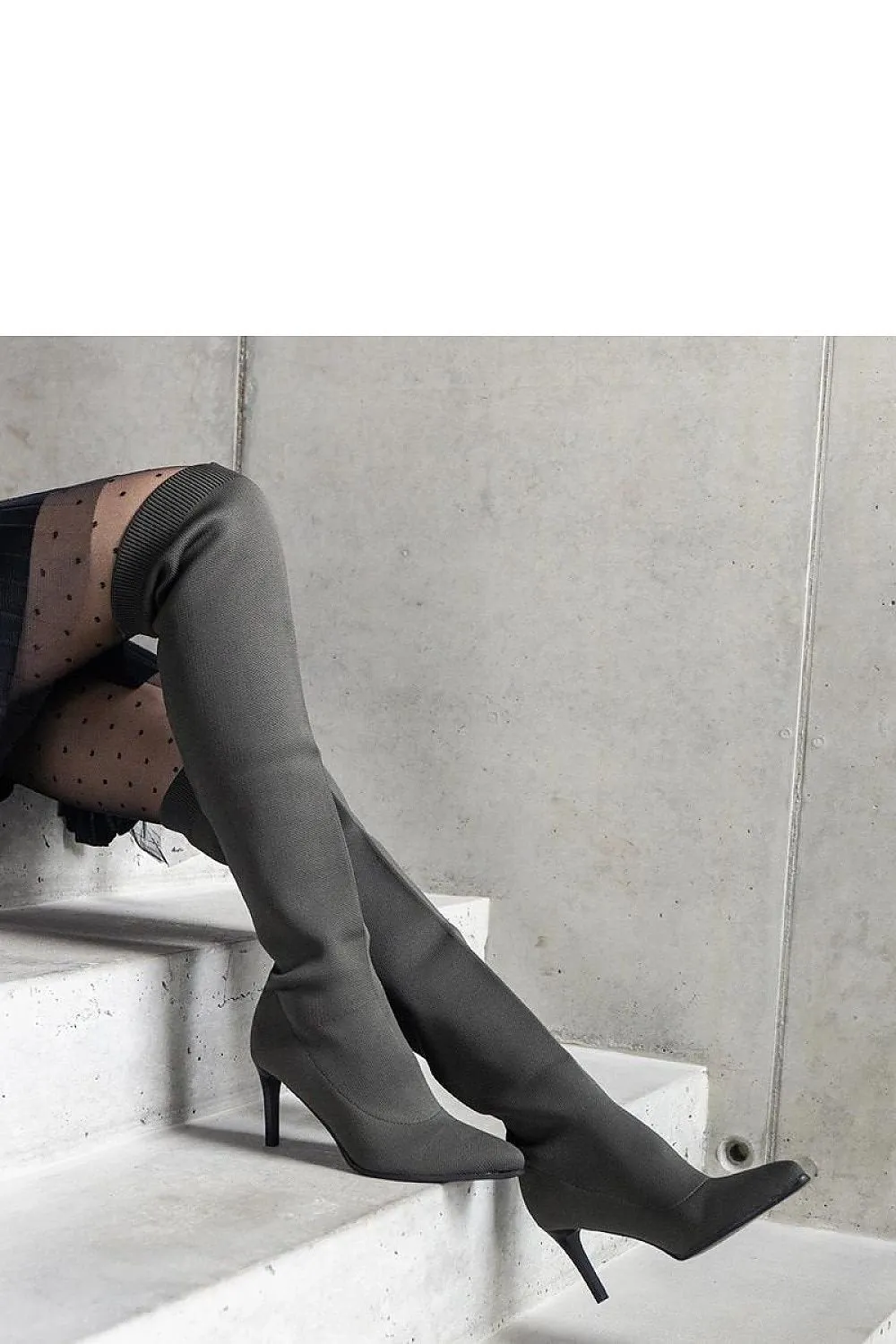 Green stiletto heeled boots
